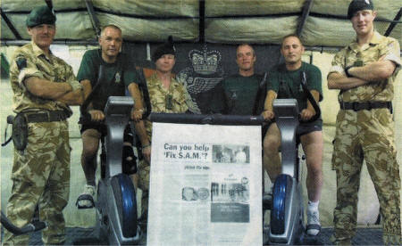 Members of the Royal Irish Regiment battle the 45 degree heat in Afghanistan to take part in a fund raising exercise bike cycle in aid of `pleasefixsam'. They cycled the distance between their Afghanistan base and their barracks in Ballymena.
