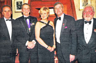 At the dinner to honour David Anderson (second right) are James Nicholson, Sir William Hall, Jane Wilson and Colonel Garth Corbett organiser.