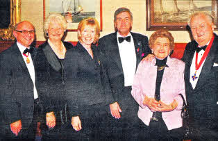 At the dinner to honour David Anderson re Sir Nigel Hamilton, Dame Mary Peters, Lady Sylvia Hermon, David Anderson, Sir William and Lady Hastings. Photo John Harrison. MBE