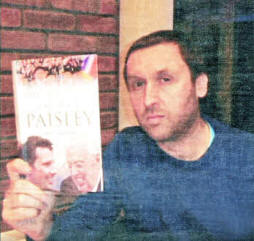 Lisburn-based journalist David Gordon with his new book 'The Fall of the House of Paisley', which is published this week