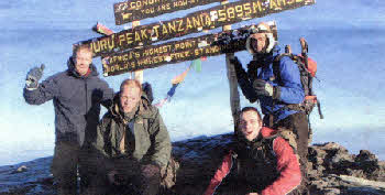 Neil Robinson with friends Robert Dunlop, Craig Scott, Steven Morrison who recently travelled to Tanzania and climbed Mount Kilimanjaro (via the Machame route), summiting Uhuru peak 15,895m) on top of the Kibo Crater at 7.15am on August 21.