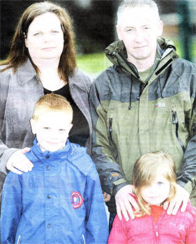 Melanie and Robert Cleland pictured with their Children Michael (8) and Eloise (3) whose car was hit by a hit and run driver. US0909-134A0