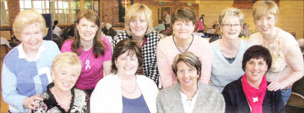 Lisburn Cancer Research Committee members and friends at the 'Big Breakfast'. L to R: (back row) Joyce Moran (Chairperson), Kathryn Dickson (Vice Chairperson), Joan Muldrew (Treasurer), Janet Stirling (Secretary), Evelyn Dane and Cathy Hull. (seated) Marie Mawhinney, Karen Elliott, Margaret Rooney and Jane George. 