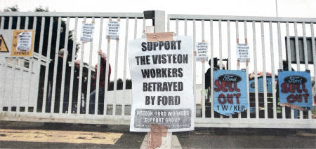 Workers holding a protest behind the locked gates at Visteon who laid off around 200 workers this week at their Finaghy plant.