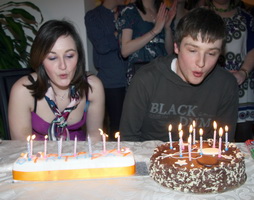 Laura and Paul Kelly blow out the candles on their 21st birthday cakes. 