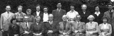 Lisburn Central Primary School staff - June 1956. L to R: (front row) Miss A Tilson, Mr R Cairns, Mrs S Crothers, Mr M Shields (Principal), Miss R Jones (Vice Principal), Mr D Thompson, Mrs M Calrns, and Miss E Rooney. (back row) Mr D Allen, Miss K Mcllroy, Miss P Bowden, Miss Deyermond, Miss White, Mr 1 McKinstry, Mrs P. Thompson, Miss McCrory, Miss B Wadsworth, and Mr C Kirkwood. 