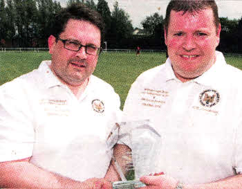Gareth Clements, Hillsborough, presents Philip Stevenson, Glentoran Legends, with a friendship plaque to mark the anniversary match. US2110-522cd
	
