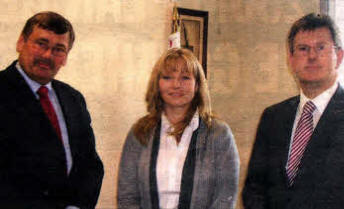 Defence secretary Bob Ainsworth with war widow Brenda Hale and MLA Jeffrey Donaldson.
	