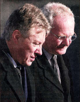 Peter Robinson and Martin McGuinness attending the funeral of John Harrison at Hillhall Presbyterian on Monday.