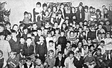 Are you in the picture? This photograph appeared in the Ulster Star back in December, 1966 and was taken at the RFD, Dunmurry Christmas Party held in the canteen.