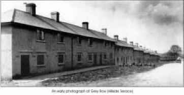 An early photograph of Grey Row (Hillside Terrace)