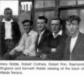 Harry Riddle, Robert Crothers, Robert Finn, Raymond Ringland and Kenneth Riddle relaxing at the back of Hillside Terrace.