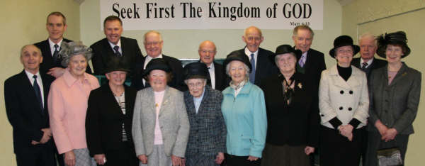 Pictured in February 2009 are some of the people that lead the worship each month at Edentrillick Mission Hall.  L to R:  (front) Robert Gamble, Irene Gamble, Myrtle Murphy, Sadie Dawson, May Dawson, Annette McCready, Agnes Mitchell, Stephanie Gamble – Organist and Jean Moorhead. (back row) Stephen Gamble, Gordon Martin, Robert Murphy, James Dawson, Irvine Dawson, Douglas Mitchell and James Moorhead.  