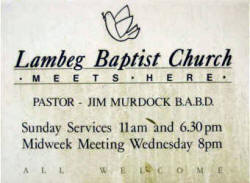 The Noticeboard at Lambeg Baptist Christian Centre showing the name of the previous Pastor, Mr Jim Murdock who is now a member of the congregation.