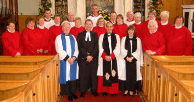 St John’s Parish Church Choir: Mrs Irene Cunningham - Organist (4th from left), Bertie Logan - Lay Reader, the Rev John Alderdice (guest speaker), the Rev Canon Roderic West - Rector and the Rev Joanne Megarrell - Curate, pictured with St John’s Parish Church Choir at the 2006 Harvest Thanksgiving Service.