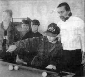 George playing pool at the Grove with some of the local lads from the Knockmore estate. US48-909SP.