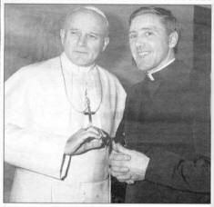 BELOW: Father Rogan with Pope John Paul 11 when he met the Holy Father less than two years after his Pontificate began. US14724SP