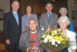 Pictured at a service celebrating the 50th anniversary of his Ordination is The Very Reverend Dr. Howard Cromie and his wife Kathleen (seated) Also included: (back row) Rev Brian Gibson, Mrs Jean Gibson, Mr Gordon Lindsay - Clerk of Session and Mrs Vivienne Weir - Elder, who presented gifts to Mr and Mrs Cromie