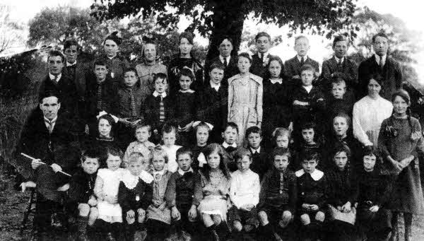 Pupils and staff of of Ballykeel Ednagonnell Primary School in Anahilt taken around the 1920's.
