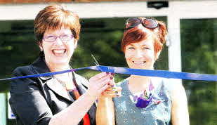 St Joseph's Primary School principal Maria Gough with Cecilia Daly opening the school's new foyer. US2112.102A0