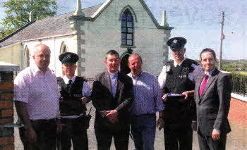 L-R Alderman James Tinsley, Constable Meehan, Rev Angus McCullough, Robert Martin, Constable Johnston and Paul Givan MIA.