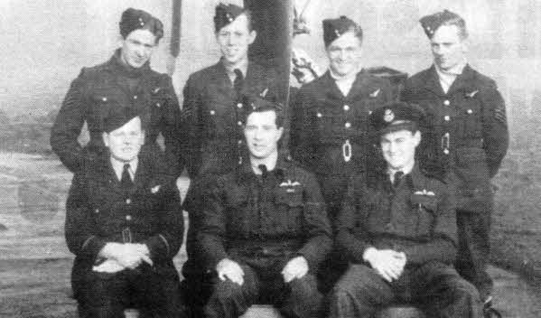 Taken at RAF Nutts Comer in October 1941, the photograph shows Terry Bulloch, then a Flight Lieutenant, with the crew of his Liberator at that time.