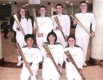 Seven members of Lisburn Gladiators Fencing Club ran the Olympic Torch relay last week in various locations across Northern Ireland. From back left to right: Kiara Kennedy, Alastair Mcllwee, Laurence Slater, Philip Slater. Front: Felix Tim, Alison Slater and Felicity McKee.