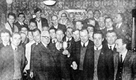 In 1969 members of the Lisburn Legion were celebrating after winning the Belfast and District Billiards League.