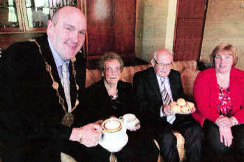 Inviting all those married in 1952 to a Diamond Jubilee Tea Party on Monday at Lagan Valley Island at 12 noon are the Mayor, Alderman William Leathem, Mrs. Elsie Bowers, Mr Robert Bowers and the Mayoress, Mrs. Kathleen Leathem.