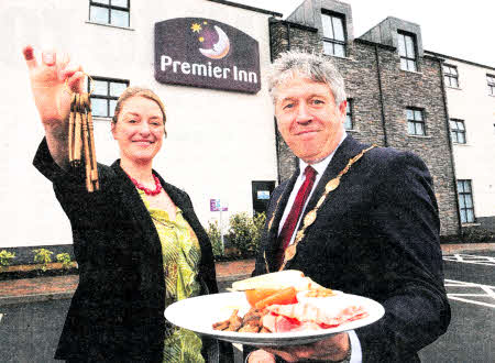 The Mayor, Councillor Brian Heading joins Jill Moore, general manager, Premier Inn Lisburn to celebrate the completion of a £1.5million expansion programme, which has added a further 30 rooms to the Lisburn hotel.